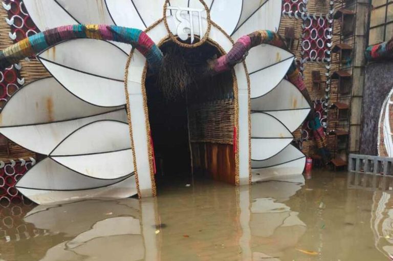 Covered Pandals Minimize Rain Damage in Kolkata Durga Puja 2025