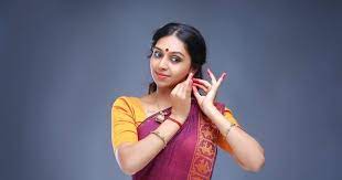 Actress Lakshmi Menan Shines at E.S. B Movie Inauguration in Kuala Lumpur in 2025